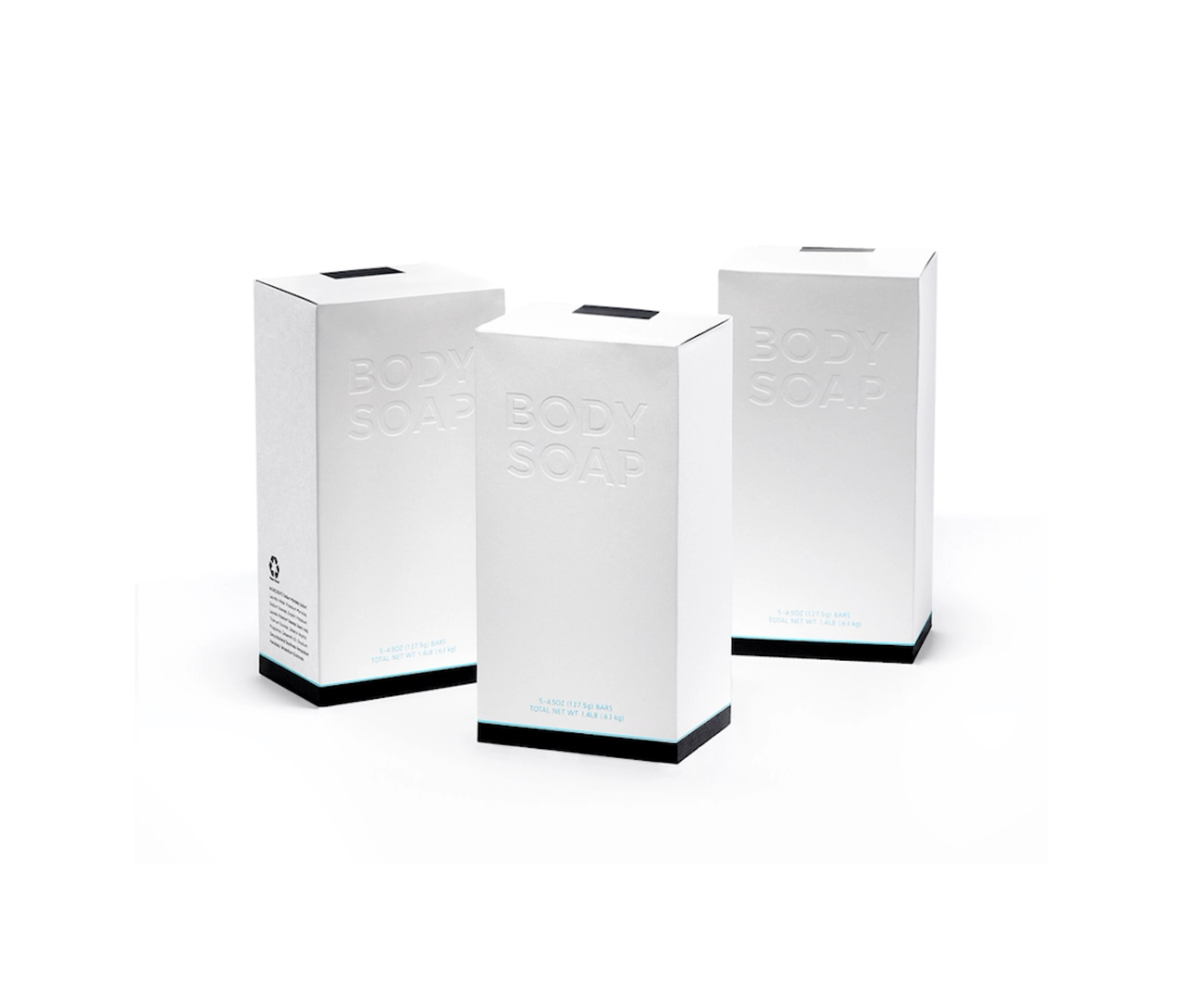 Three plain white rectangular paper boxes that read “Body Soap” in embossed lettering